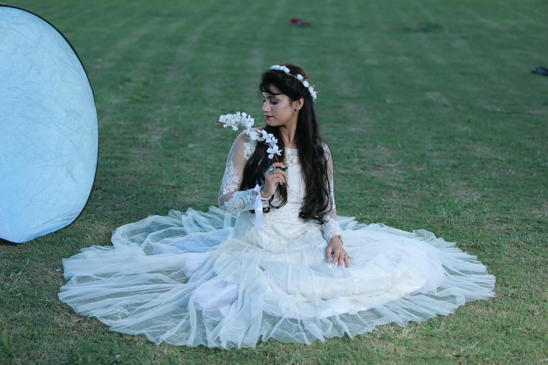 bride posing in a park
